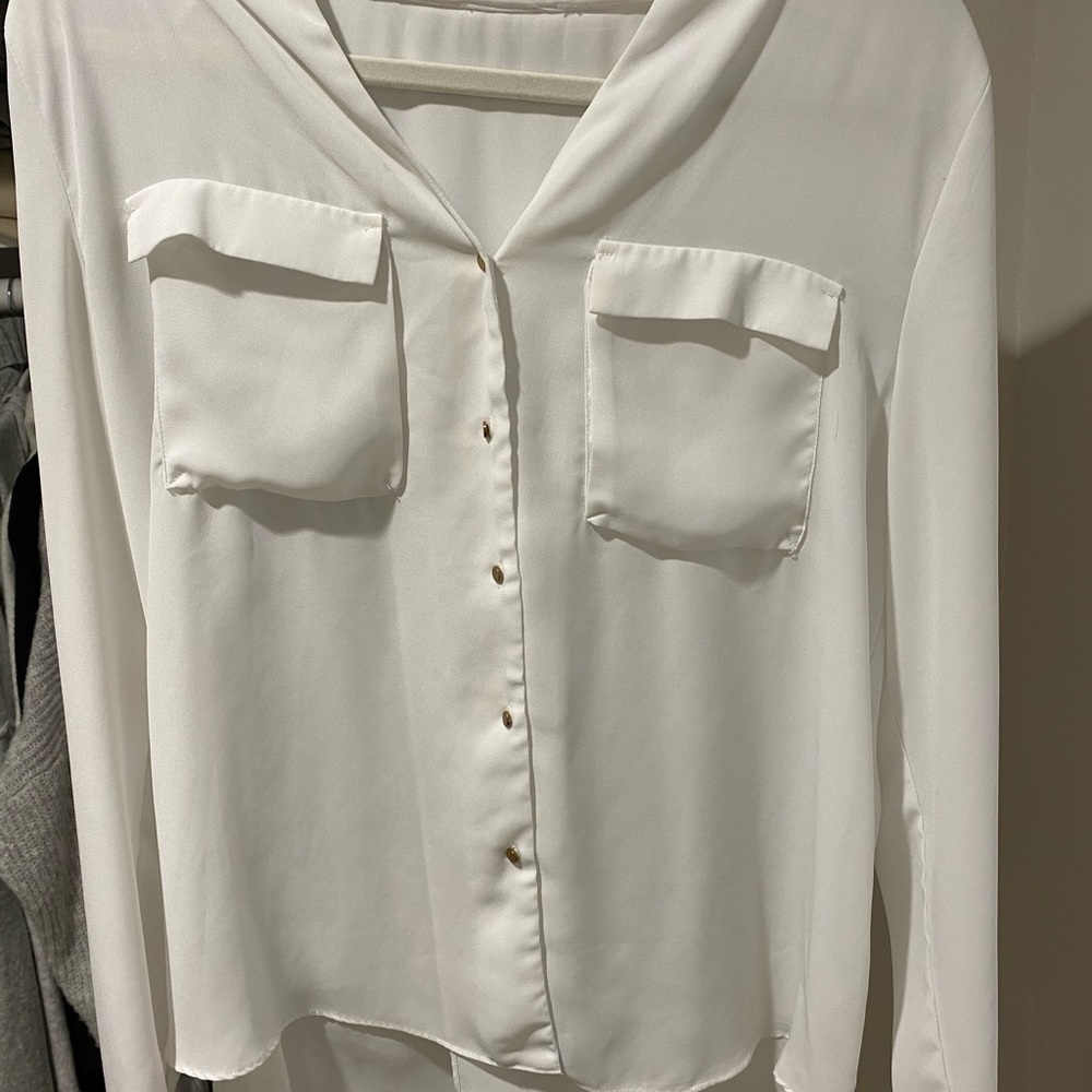White blouse with open slit back